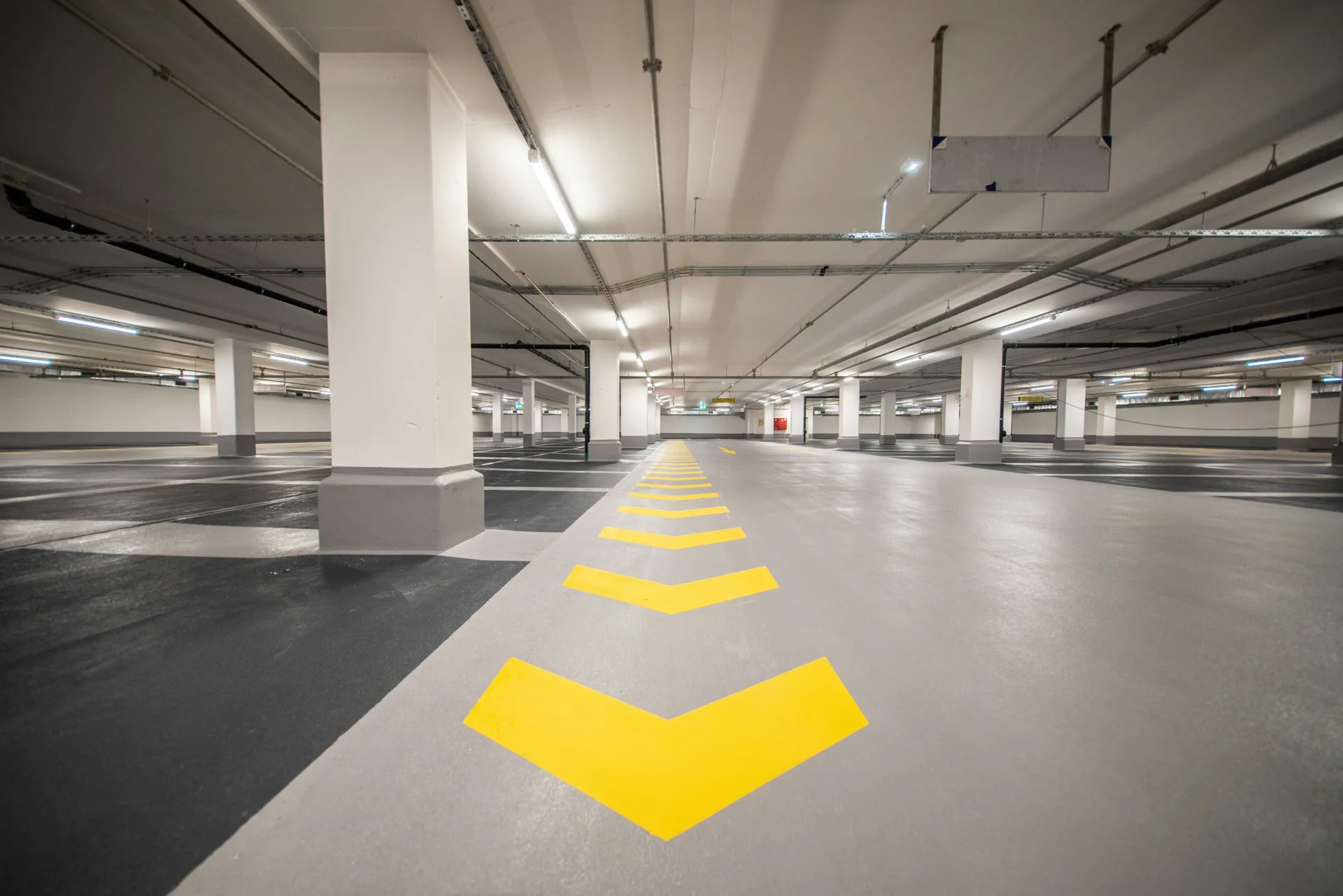 commercial parking lot section patched and matched to the surrounding slab