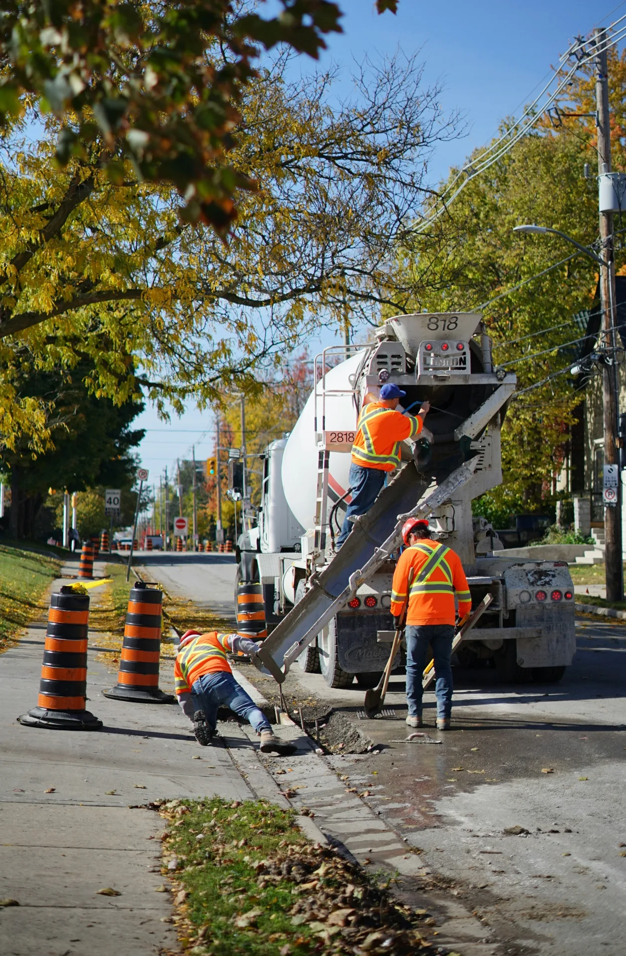 commercial sidewalk pour being inspected during construction