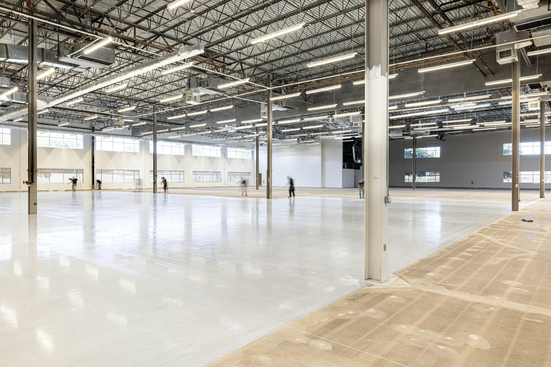 before and after of an epoxy garage floor coating