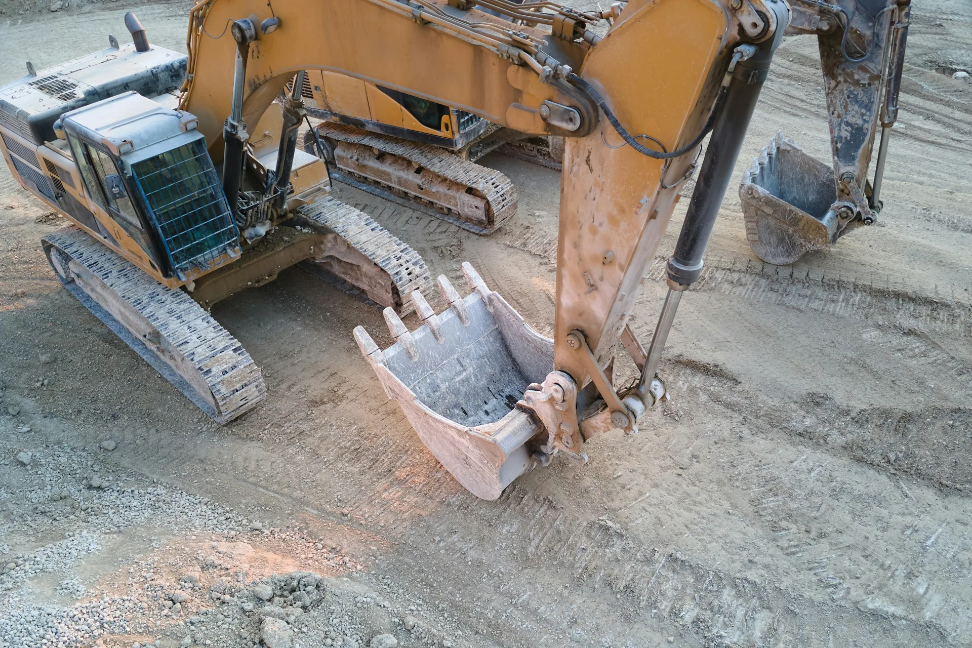 excavator working on a heavy-equipment concrete pad in Minneapolis