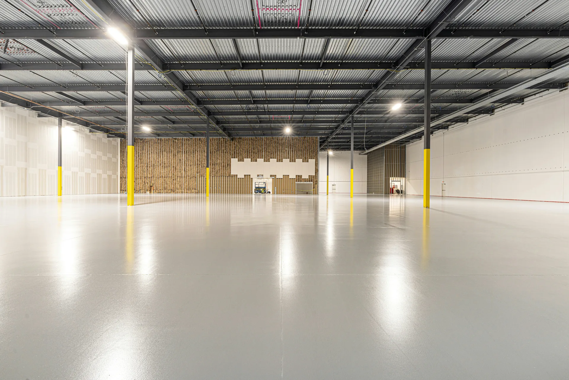 cold-storage warehouse floor with column protectors in Minneapolis