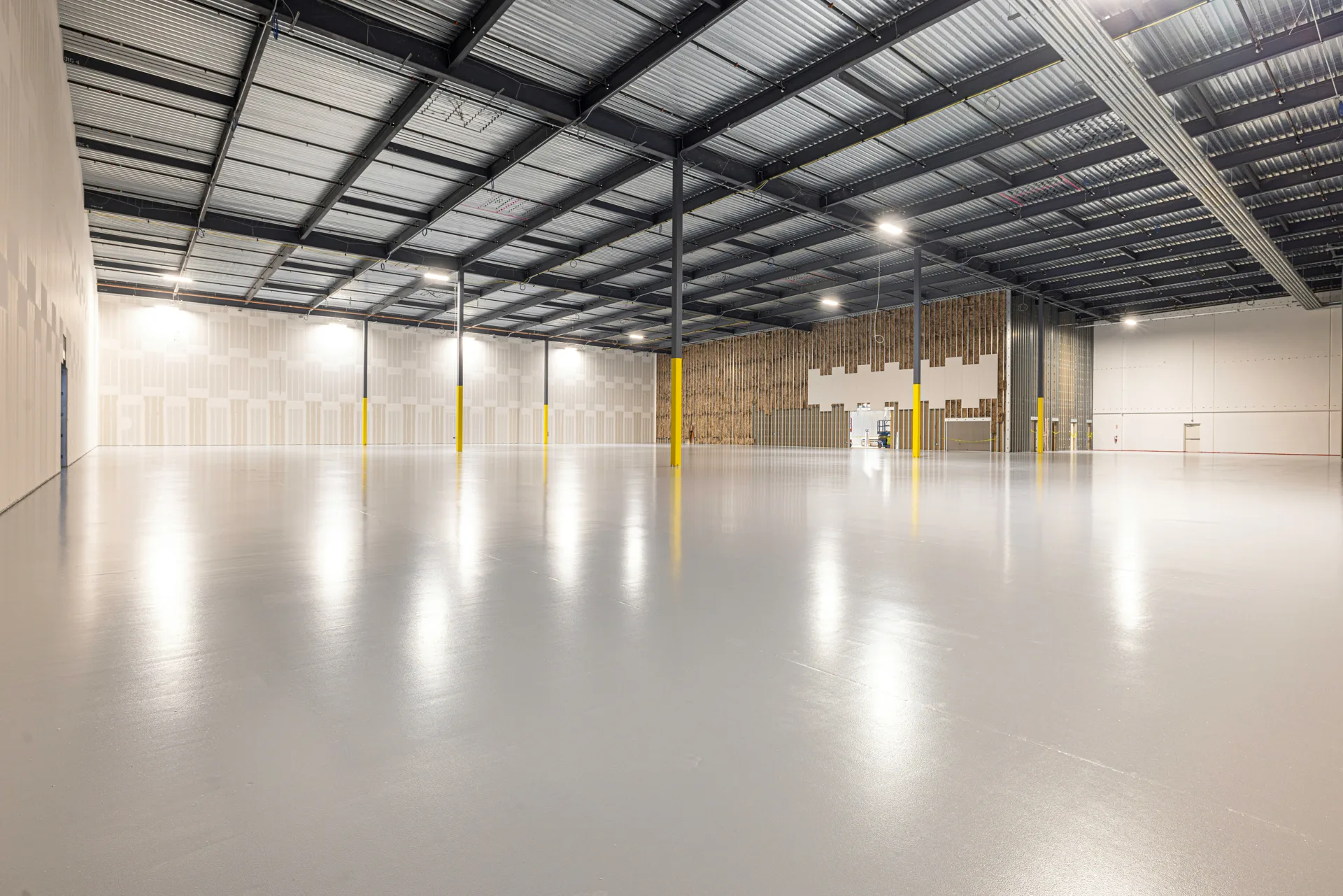 finished grey epoxy warehouse floor in a Minneapolis distribution centre