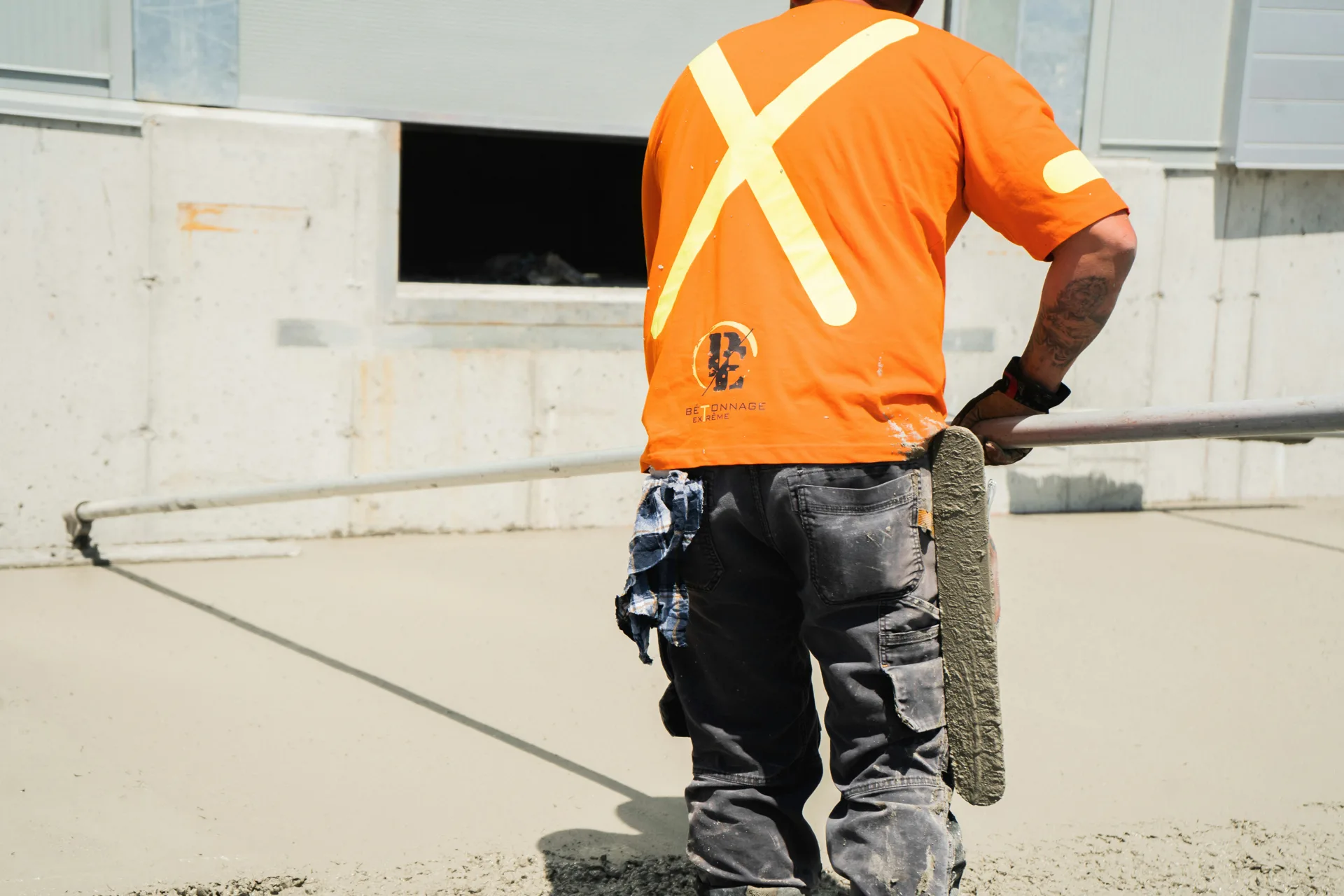 finisher working an Ardex application on a Minneapolis floor