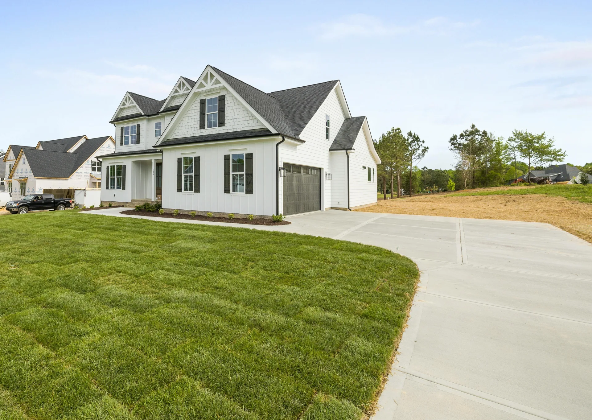 curving concrete driveway at a Barrhaven valley home