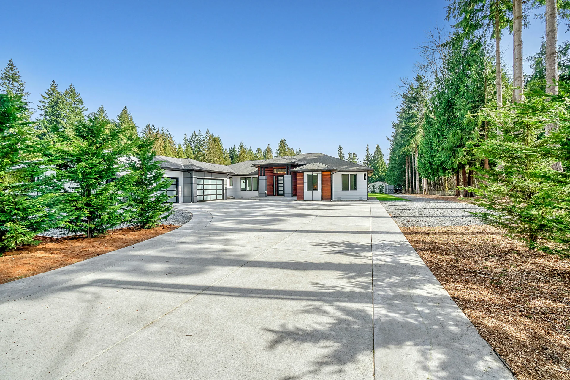 long coloured concrete driveway at a Minneapolis home