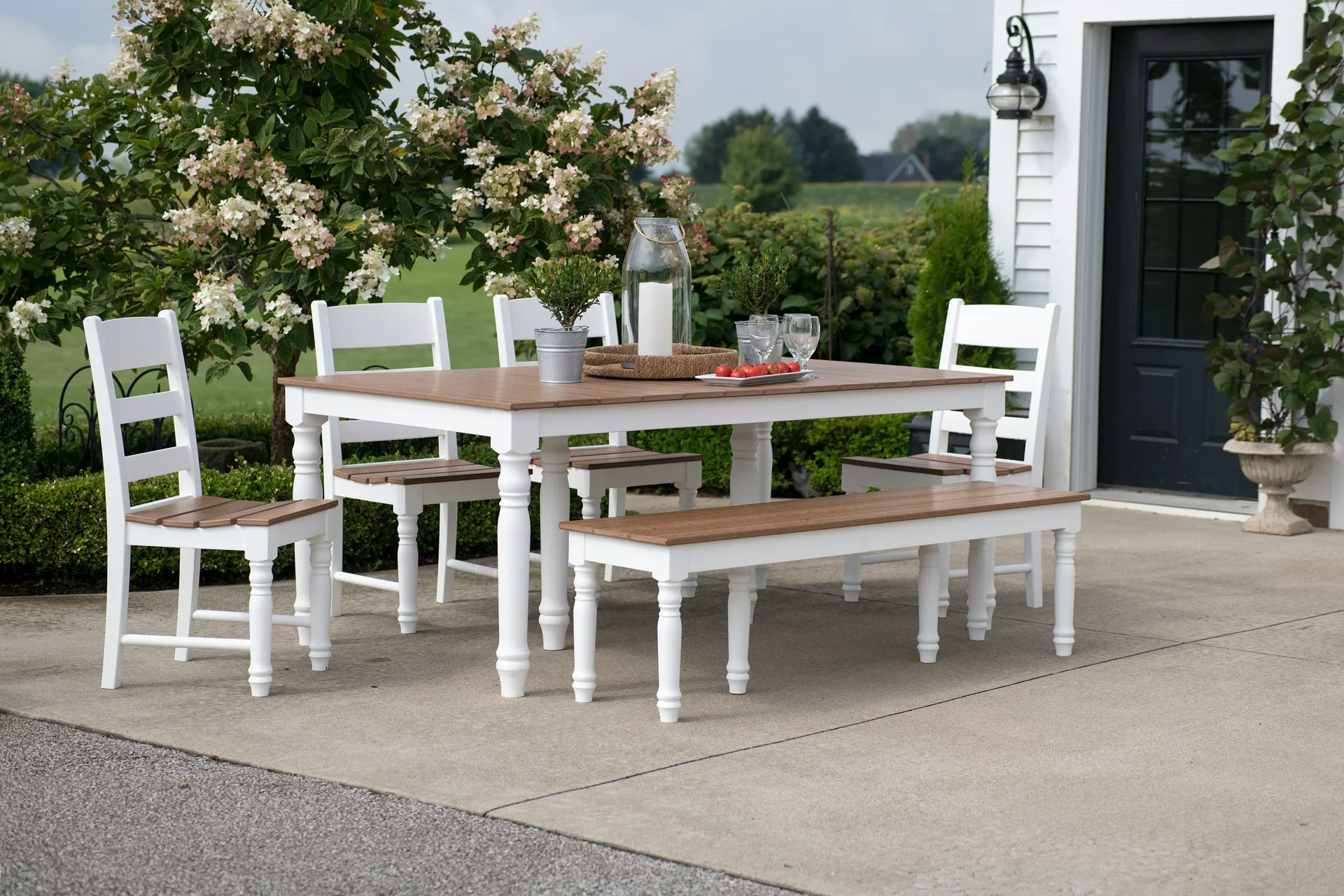 concrete patio with a dining table at a Minneapolis farmhouse
