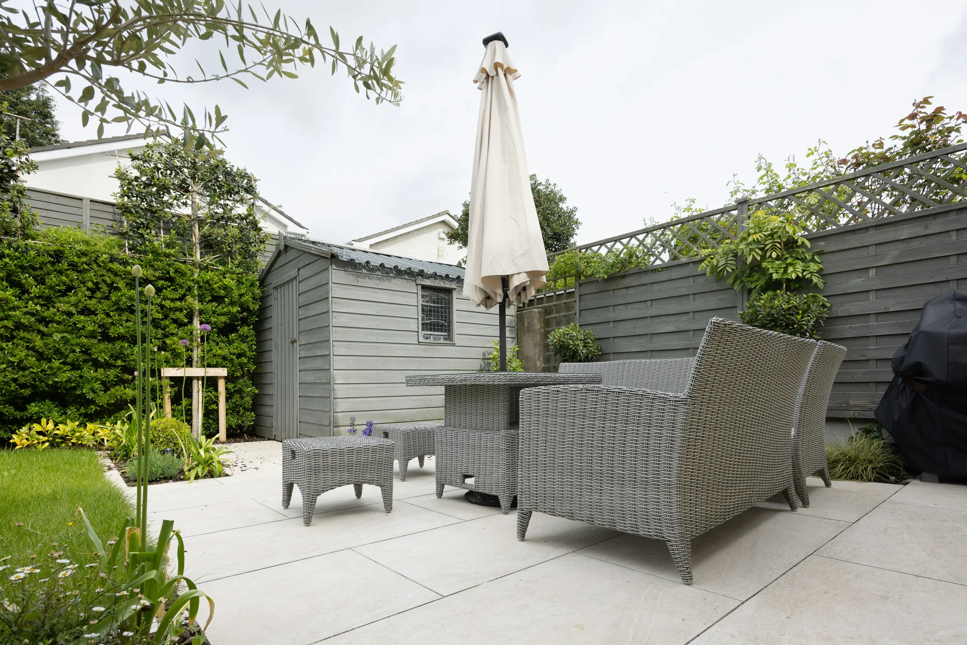 plain concrete patio in a Minneapolis garden setting