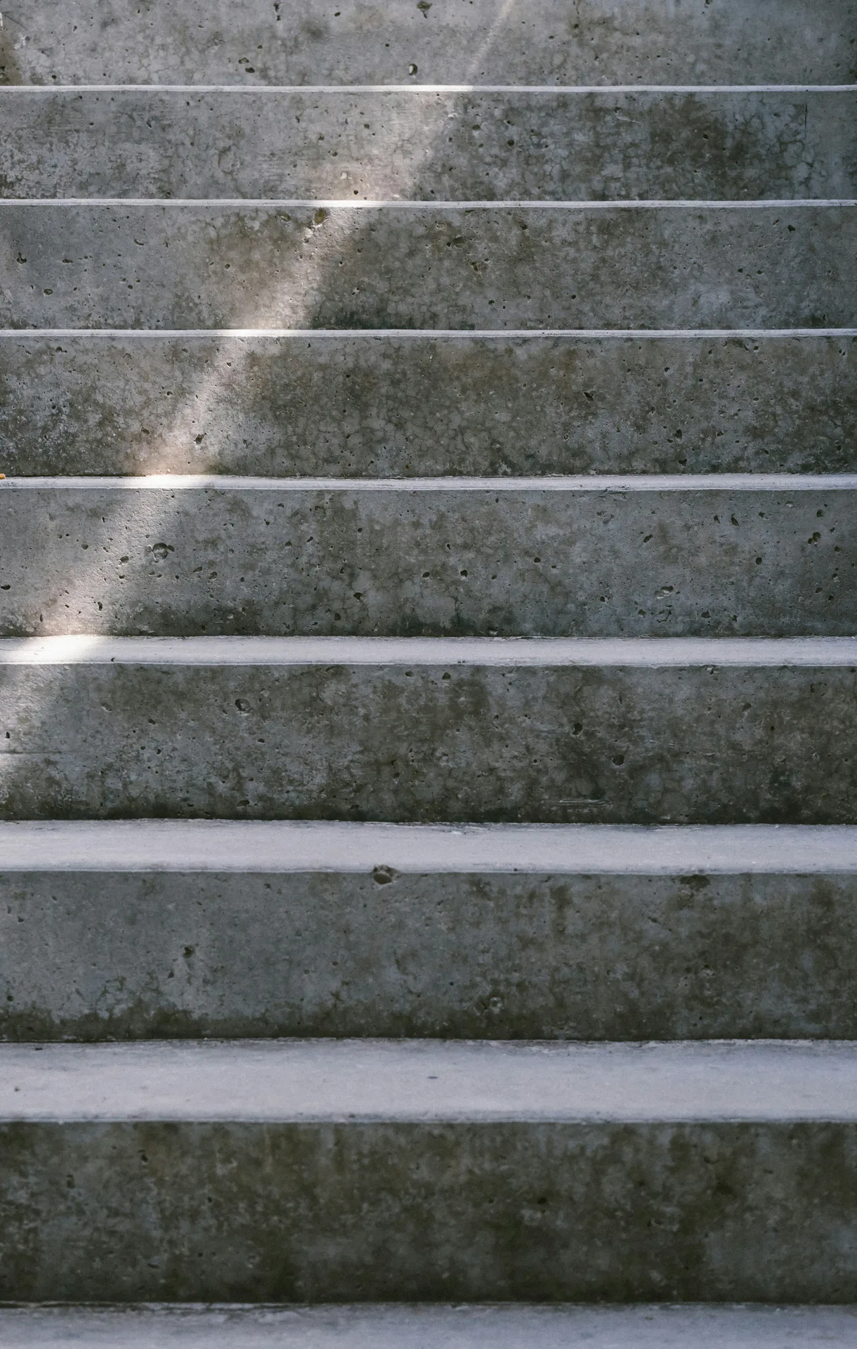 textured concrete entry steps at a Minneapolis home