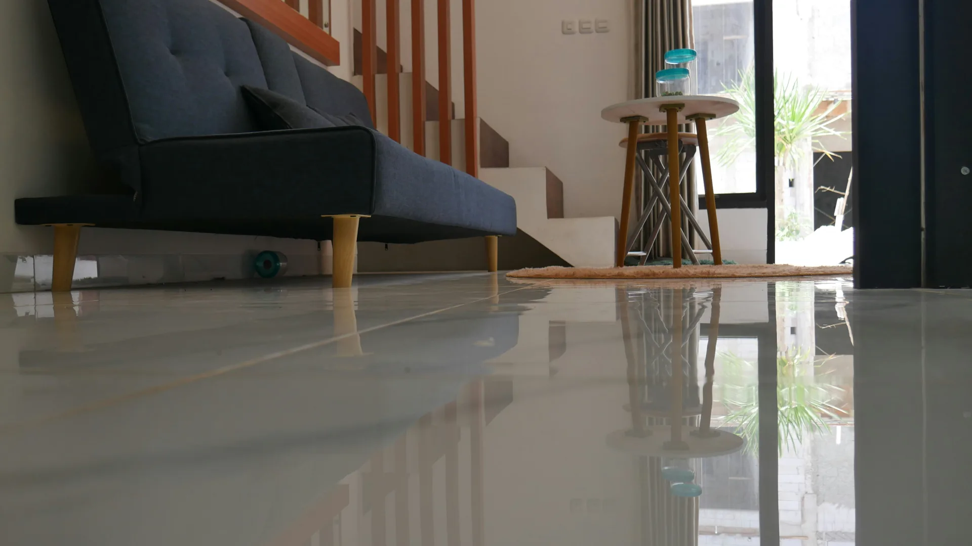 polished concrete floor reflecting light in a Minneapolis living room
